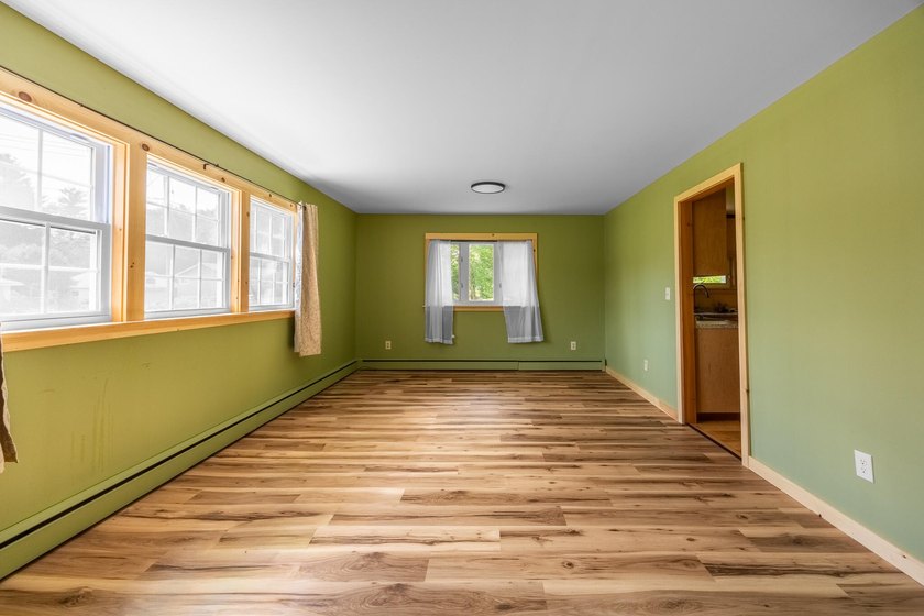 Welcome to this spacious and versatile 4-bedroom, 3 full - photo 12