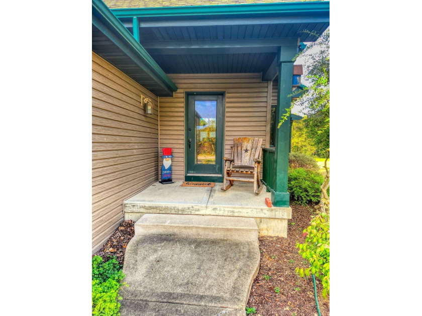Nestled along a stunning golf course with beautiful views of the - photo 4