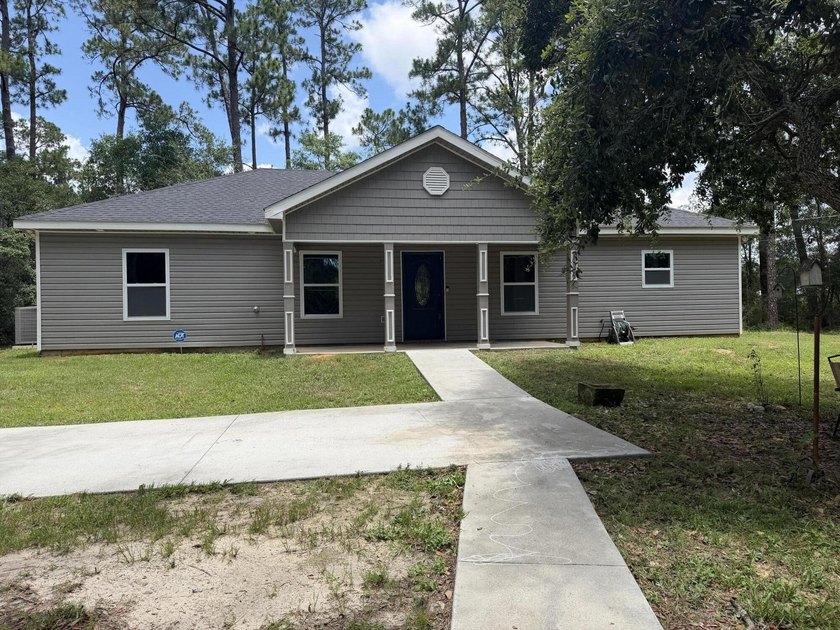 Welcome to 130 Emmons Lane, a beautifully maintained, newer - photo 3