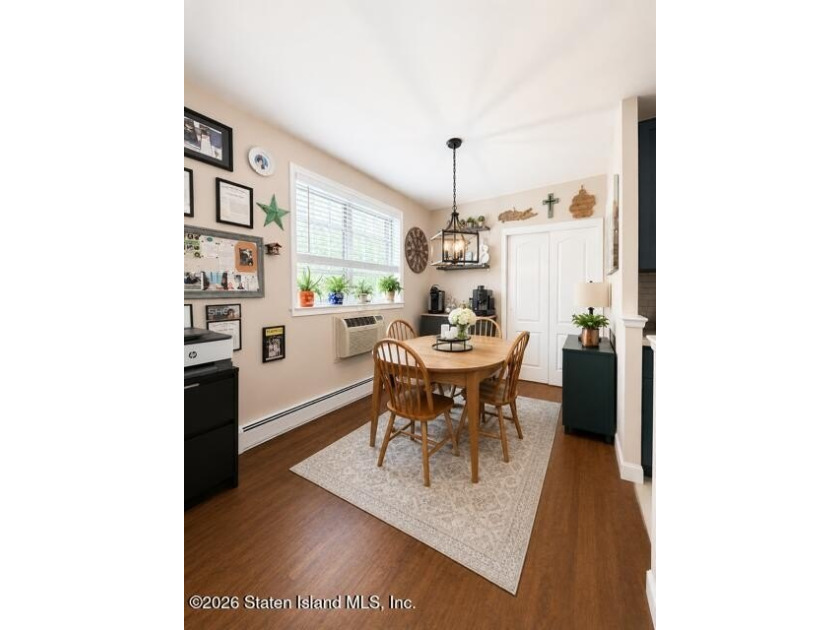 Updated 1-bedroom, 1-bath home featuring a modern kitchen, wood - photo 4