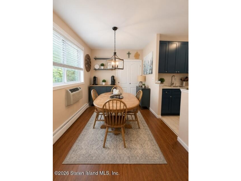 Updated 1-bedroom, 1-bath home featuring a modern kitchen, wood - photo 5