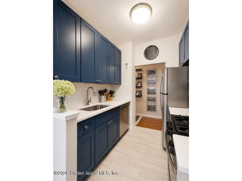 Updated 1-bedroom, 1-bath home featuring a modern kitchen, wood - photo 6