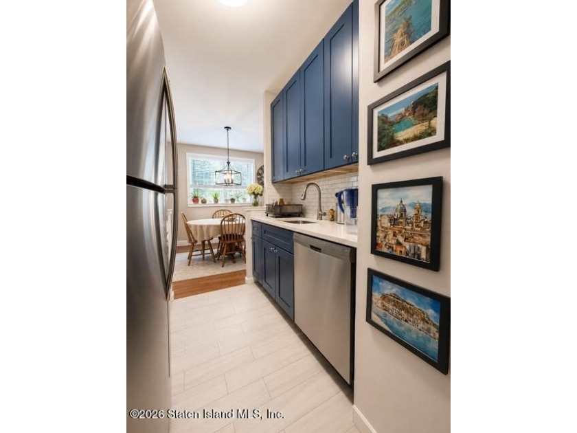 Updated 1-bedroom, 1-bath home featuring a modern kitchen, wood - photo 7