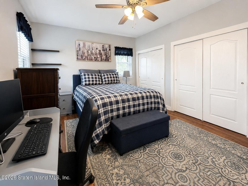 Updated 1-bedroom, 1-bath home featuring a modern kitchen, wood - photo 10