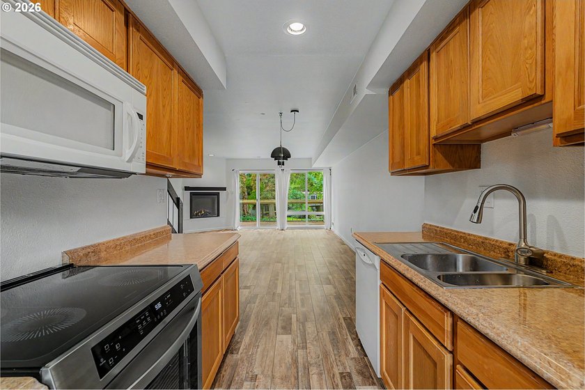 Tucked into a peaceful community surrounded by mature trees - photo 12