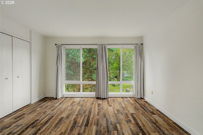Tucked into a peaceful community surrounded by mature trees - photo 16