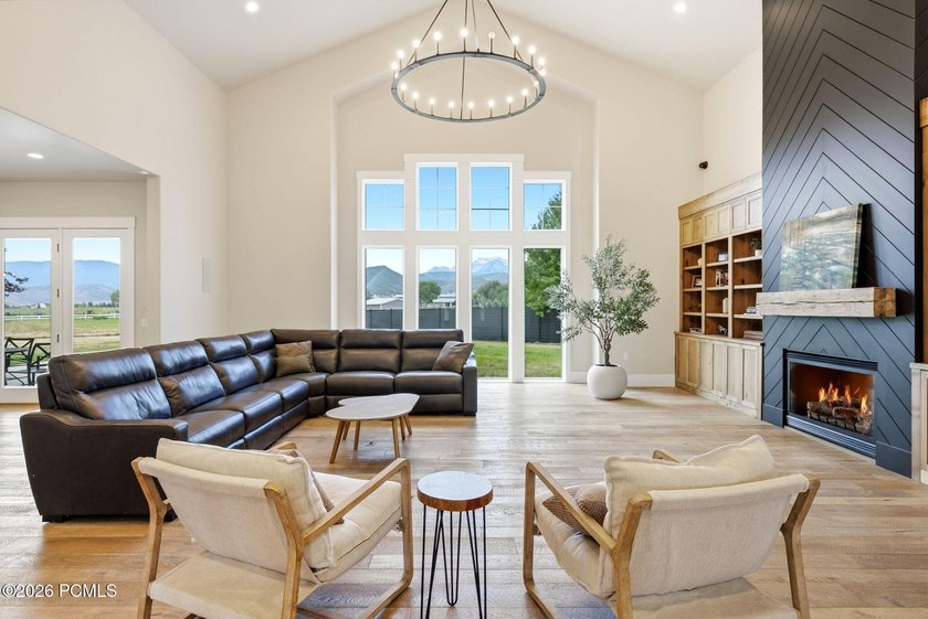 Set on a fully landscaped acre with open views of Mount - photo 3