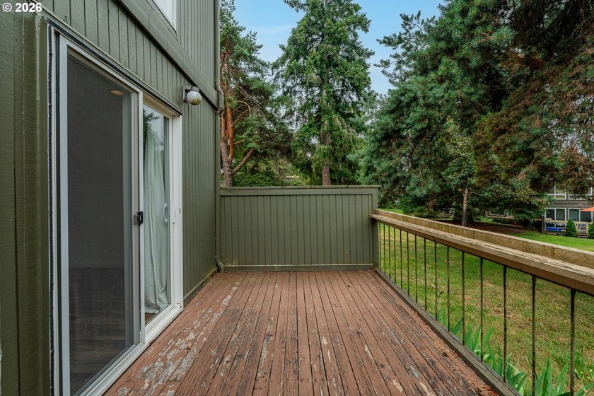 Tucked into a peaceful community surrounded by mature trees - photo 23