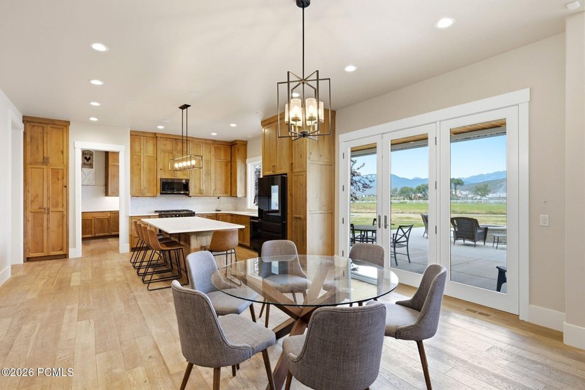 Set on a fully landscaped acre with open views of Mount - photo 5