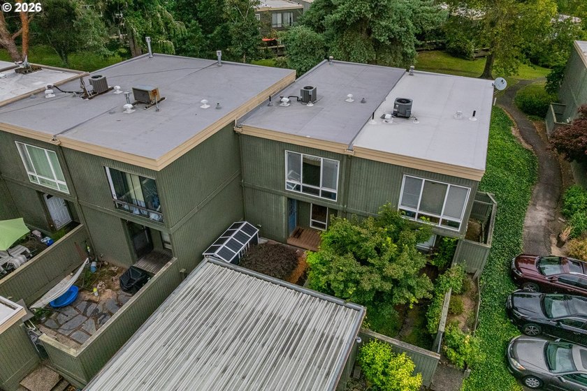 Tucked into a peaceful community surrounded by mature trees - photo 25