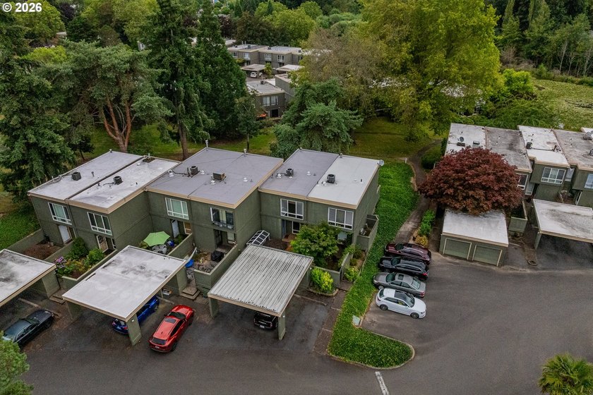 Tucked into a peaceful community surrounded by mature trees - photo 26