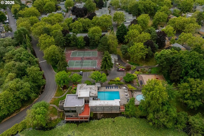 Tucked into a peaceful community surrounded by mature trees - photo 29