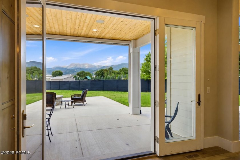 Set on a fully landscaped acre with open views of Mount - photo 10