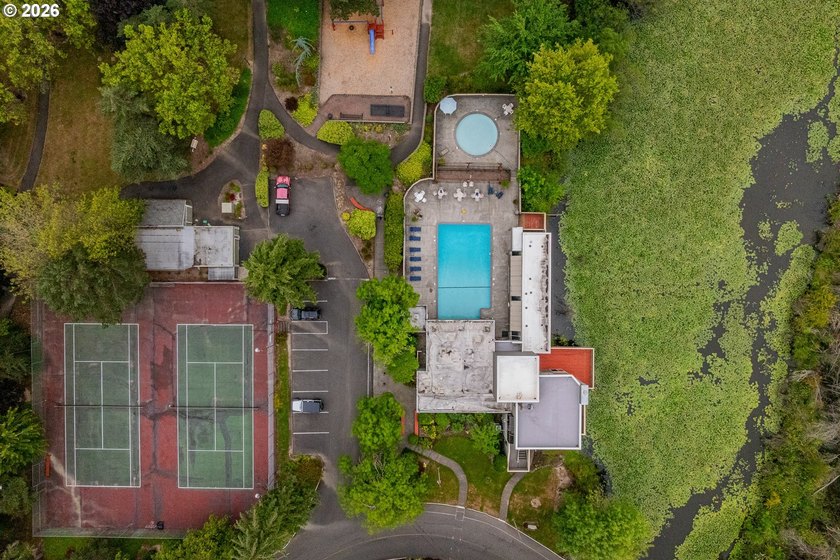 Tucked into a peaceful community surrounded by mature trees - photo 31