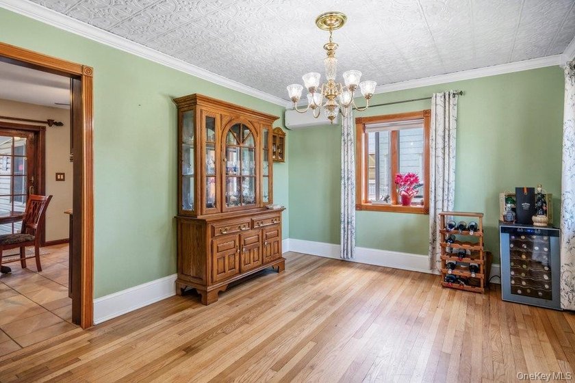 Set on a level, fully fenced property in East Islip, this 3 - photo 6