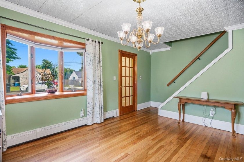 Set on a level, fully fenced property in East Islip, this 3 - photo 7