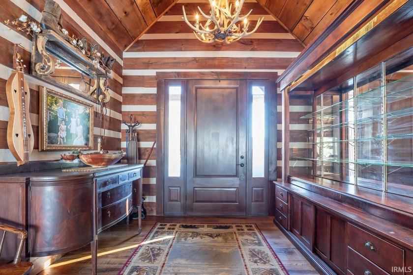 This one-of-a-kind custom log home, built in 2015, blends luxury - photo 2