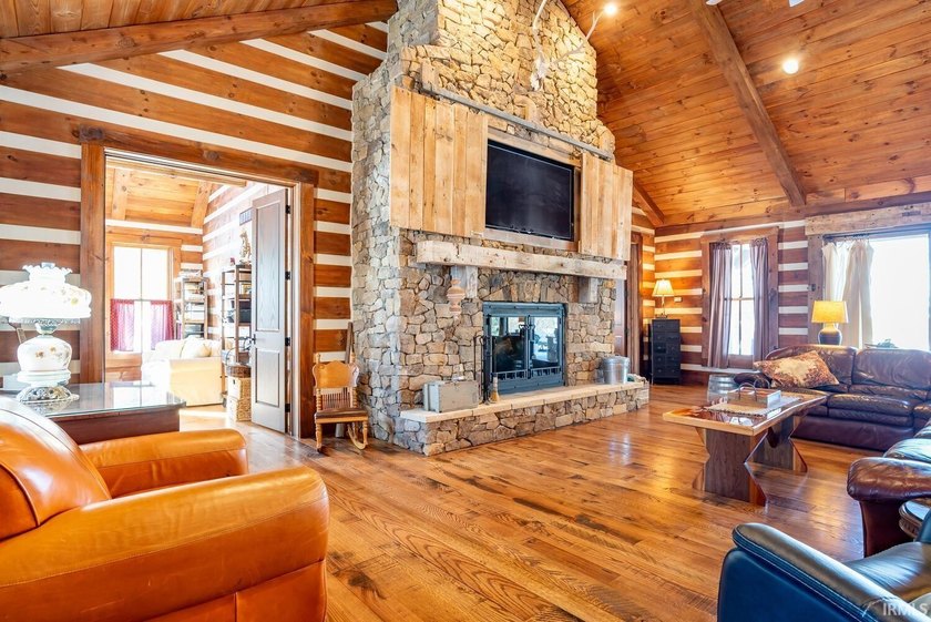 This one-of-a-kind custom log home, built in 2015, blends luxury - photo 3