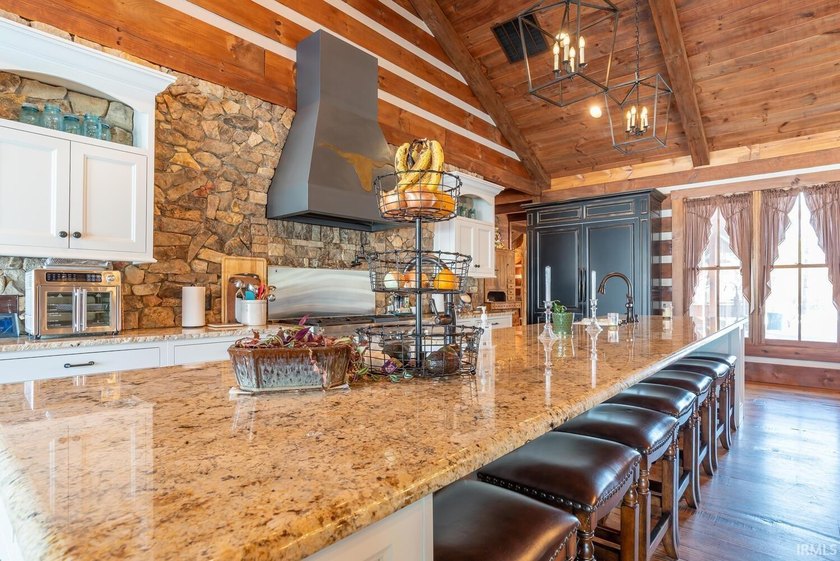 This one-of-a-kind custom log home, built in 2015, blends luxury - photo 8