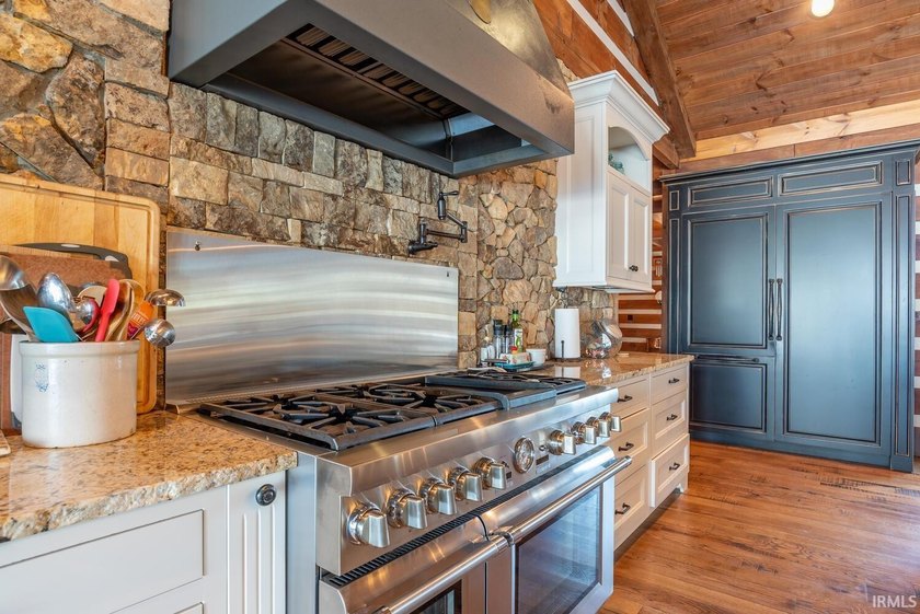 This one-of-a-kind custom log home, built in 2015, blends luxury - photo 9