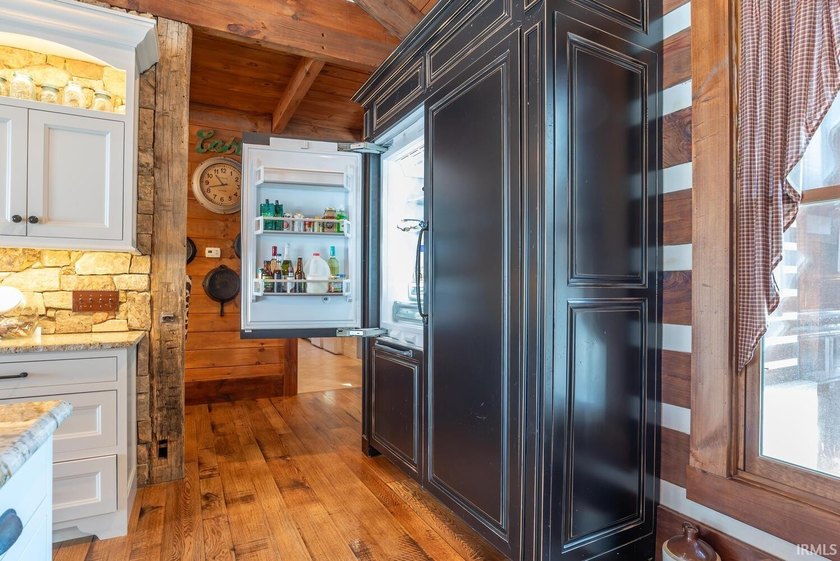 This one-of-a-kind custom log home, built in 2015, blends luxury - photo 10