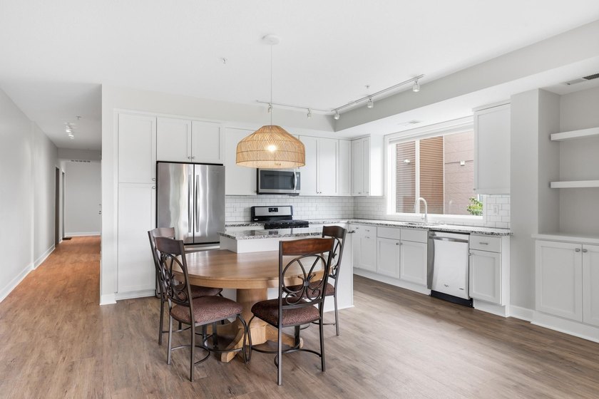 Experience sophisticated, low-maintenance living at **Wooddale - photo 5