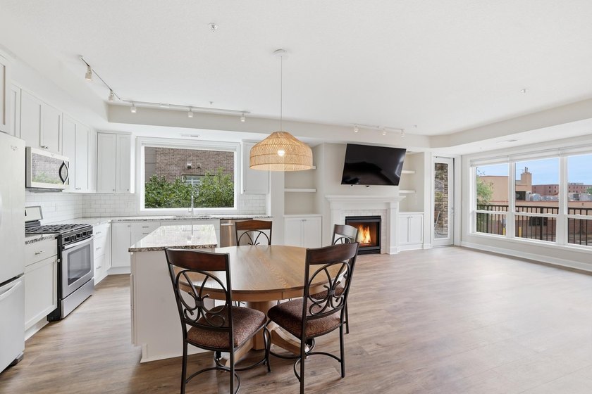Experience sophisticated, low-maintenance living at **Wooddale - photo 8