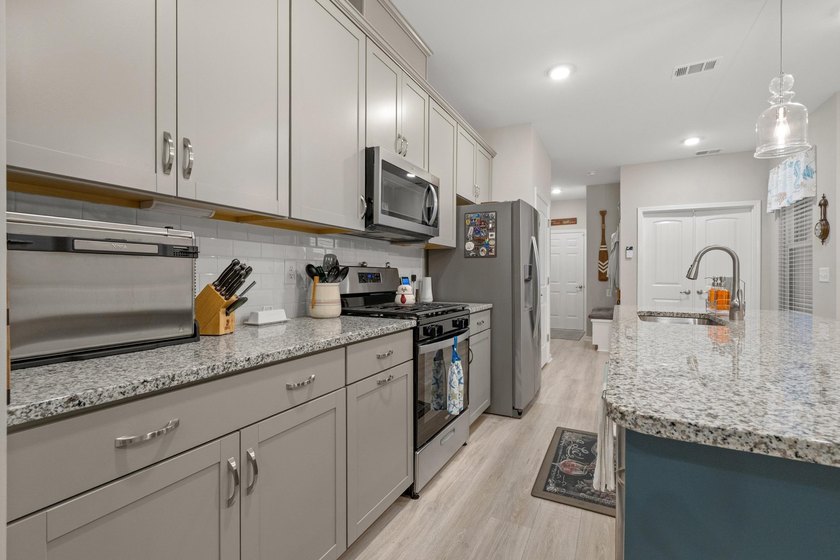 Welcome to the sought-after Garden Homes at Bella Vita, where - photo 9