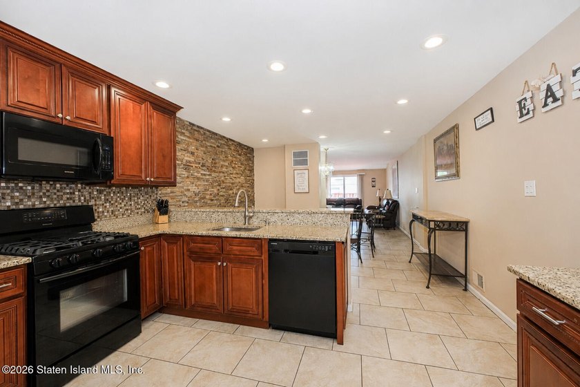 This lovely home in Sharrotts Estates, Woodrow, Staten Island is - photo 3