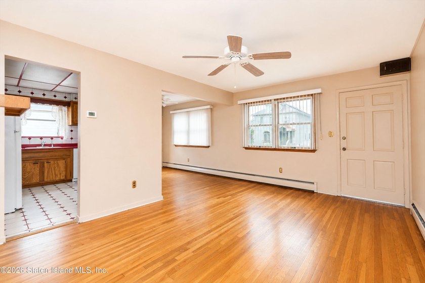 A charming 4-bedroom, 1-bath Cape Cod in Willowbrook, this home - photo 5