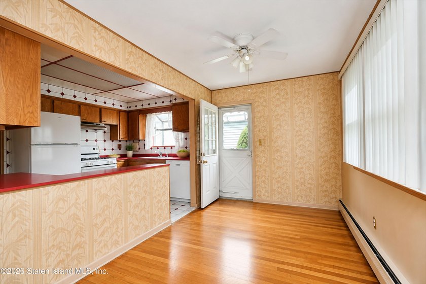 A charming 4-bedroom, 1-bath Cape Cod in Willowbrook, this home - photo 6