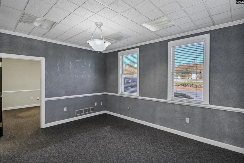 This well-maintained 3,500+/- square foot office building with - photo 15