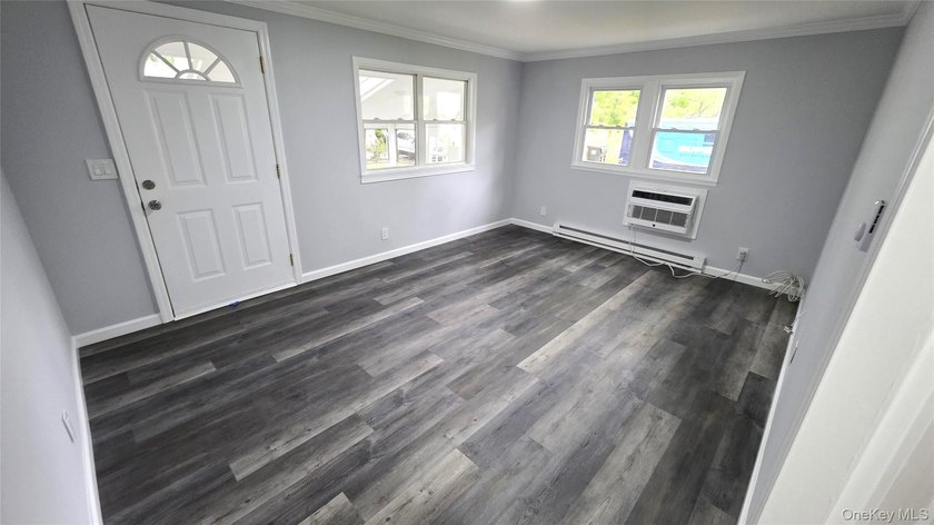 Fully renovated with bright spaces, this home truly is move-in - photo 6