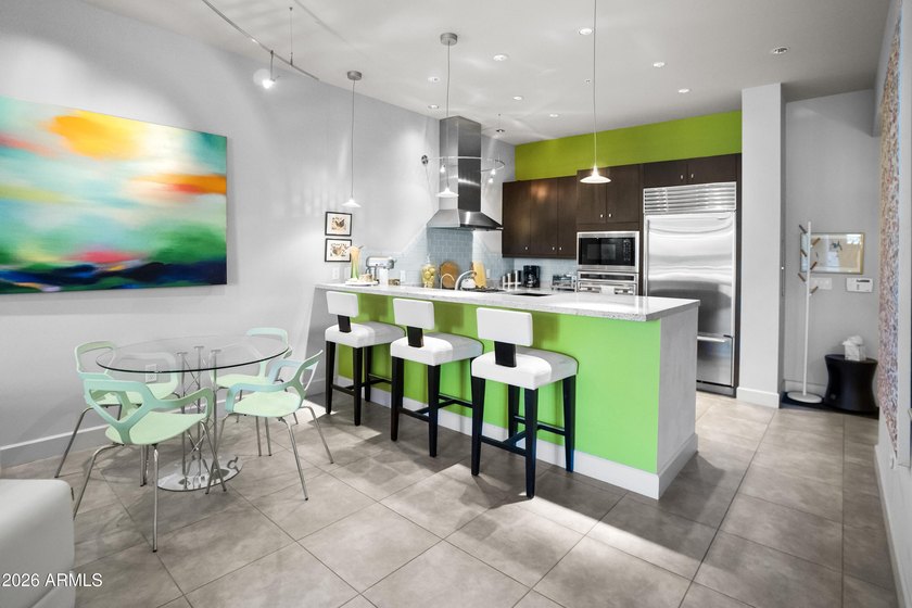 Welcome home to this amazingly beautiful end, ground-floor unit - photo 2