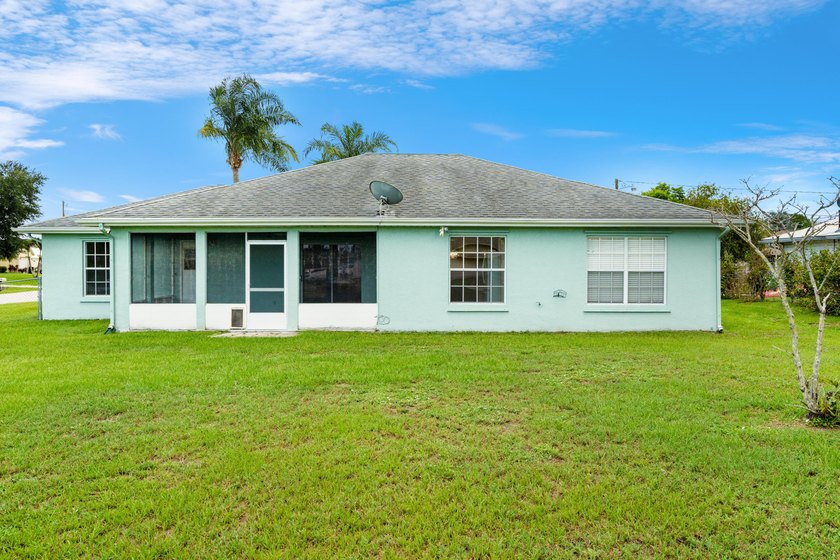 Welcome to 2297 SE Marsh Ave, a 3-bedroom, 2-bath home in a - photo 32