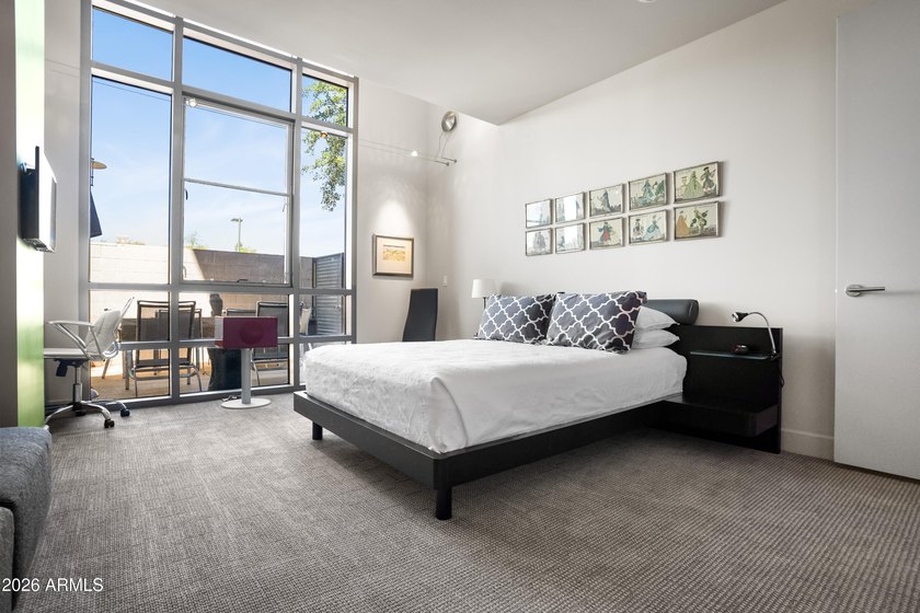 Welcome home to this amazingly beautiful end, ground-floor unit - photo 3
