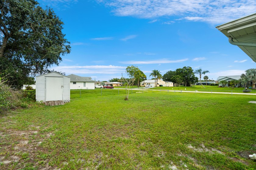 Welcome to 2297 SE Marsh Ave, a 3-bedroom, 2-bath home in a - photo 33