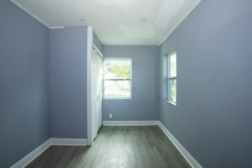 Home is move-in ready! This spacious 4-bedroom, 2-bath - photo 12
