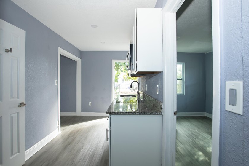 Home is move-in ready! This spacious 4-bedroom, 2-bath - photo 15