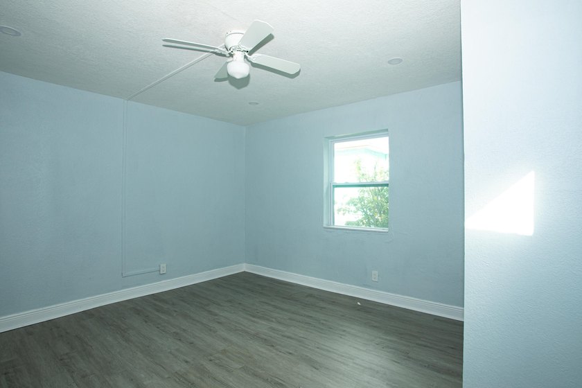 Home is move-in ready! This spacious 4-bedroom, 2-bath - photo 17