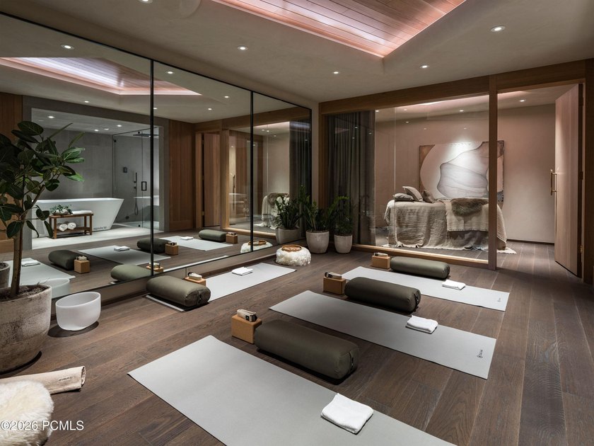 Experience the pinnacle of mountain living in this impeccably - photo 9