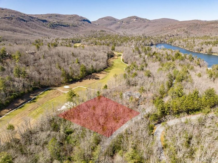 This vacant lot spans .81 acres, presenting an ideal canvas for - photo 3