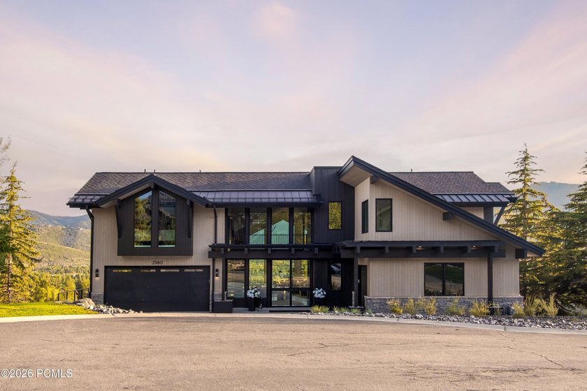 Set within the coveted West Ridge neighborhood of Park Meadows - photo 3