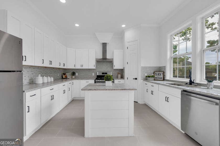 This stunning newly built residence in Douglasville offers the - photo 11