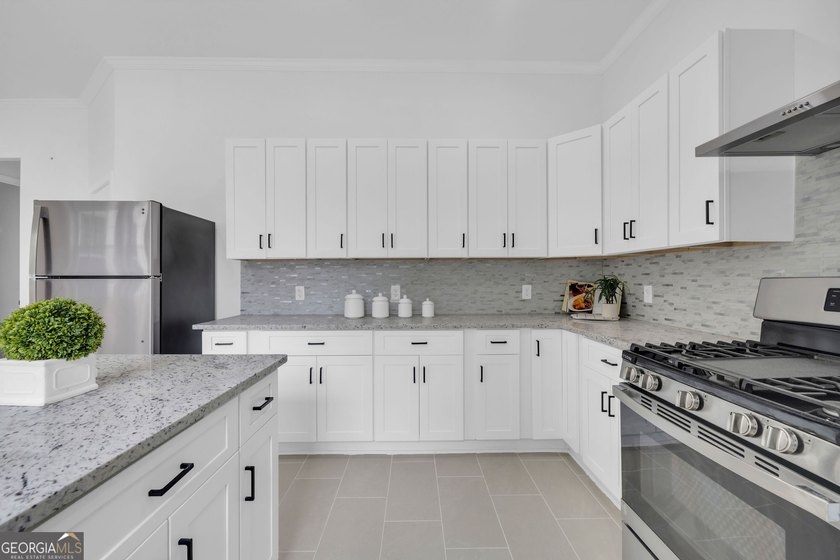 This stunning newly built residence in Douglasville offers the - photo 12