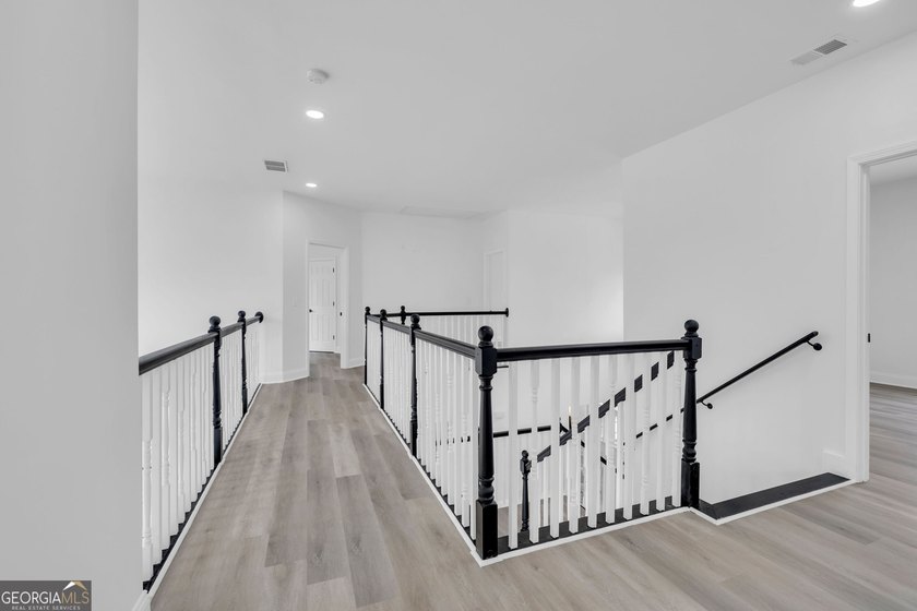 This stunning newly built residence in Douglasville offers the - photo 13