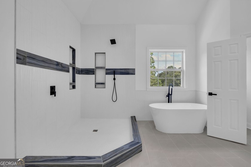 This stunning newly built residence in Douglasville offers the - photo 16
