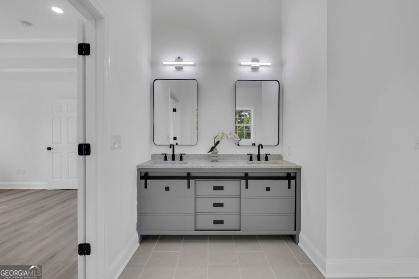This stunning newly built residence in Douglasville offers the - photo 18