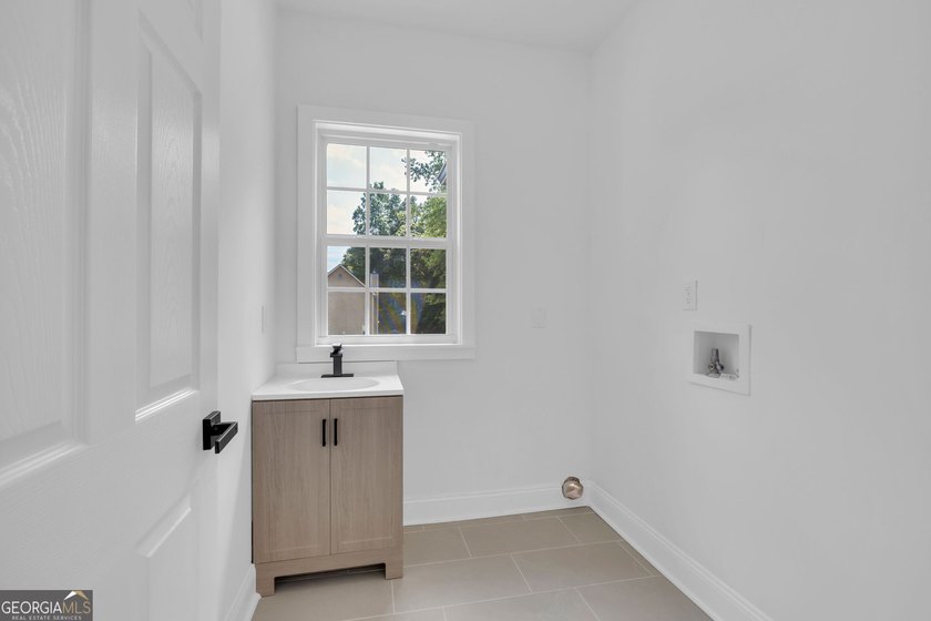 This stunning newly built residence in Douglasville offers the - photo 19
