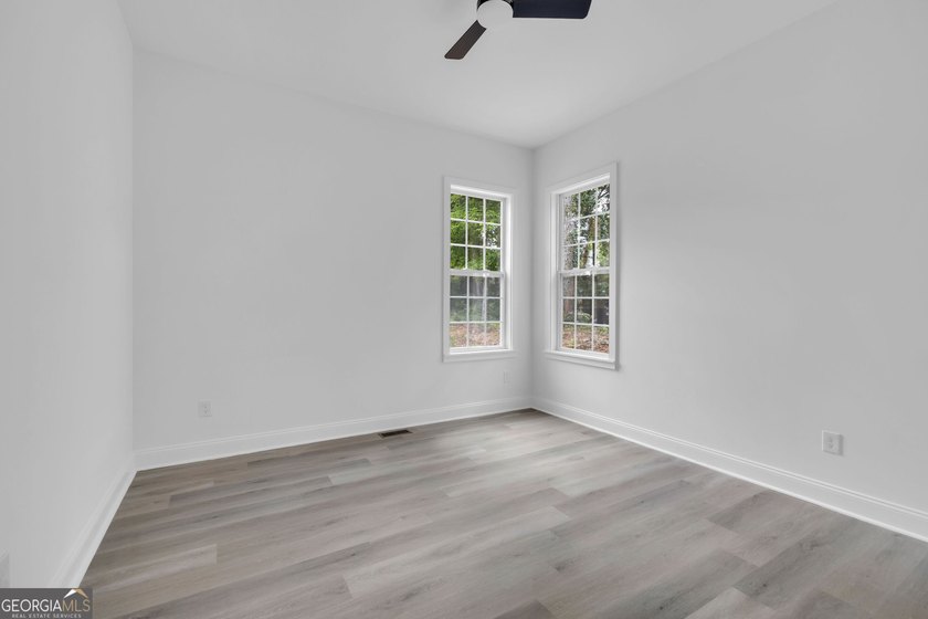This stunning newly built residence in Douglasville offers the - photo 20